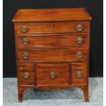 A George III style mahogany side cabinet in the form of a chest of drawers, crossbanded