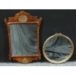 A mahogany Vauxhall mirror, 79cm x 51cm; a circular wall mirror with ribbon tied gesso frame, 48cm x