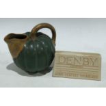 An unusual Bourne Denby pumpkin jug, glazed in green; a Denby Coloroli Hand Crafted Stoneware
