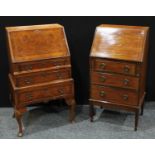 A 20th century walnut and mahogany bureau, fall front enclosing pigeonholes and small drawers