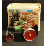 A Mamod SR1A live steam, steam roller, boxed with steering rod, detachable scuttle, burner box and