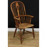 A Windsor armchair, pierced slat, h-stretcher