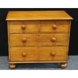 A Victorian pine chest of drawers, oversailing rectangular top above two short and two long