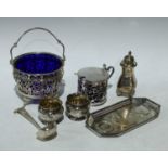 A George V hallmarked silver sugar bowl, pierced decoration, blue glass liner, Birmingham 1926; a