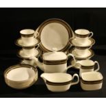 A Royal Doulton Cadenza pattern teapot, milk jug, sugar bowl, six teacups, saucers and tea plates,