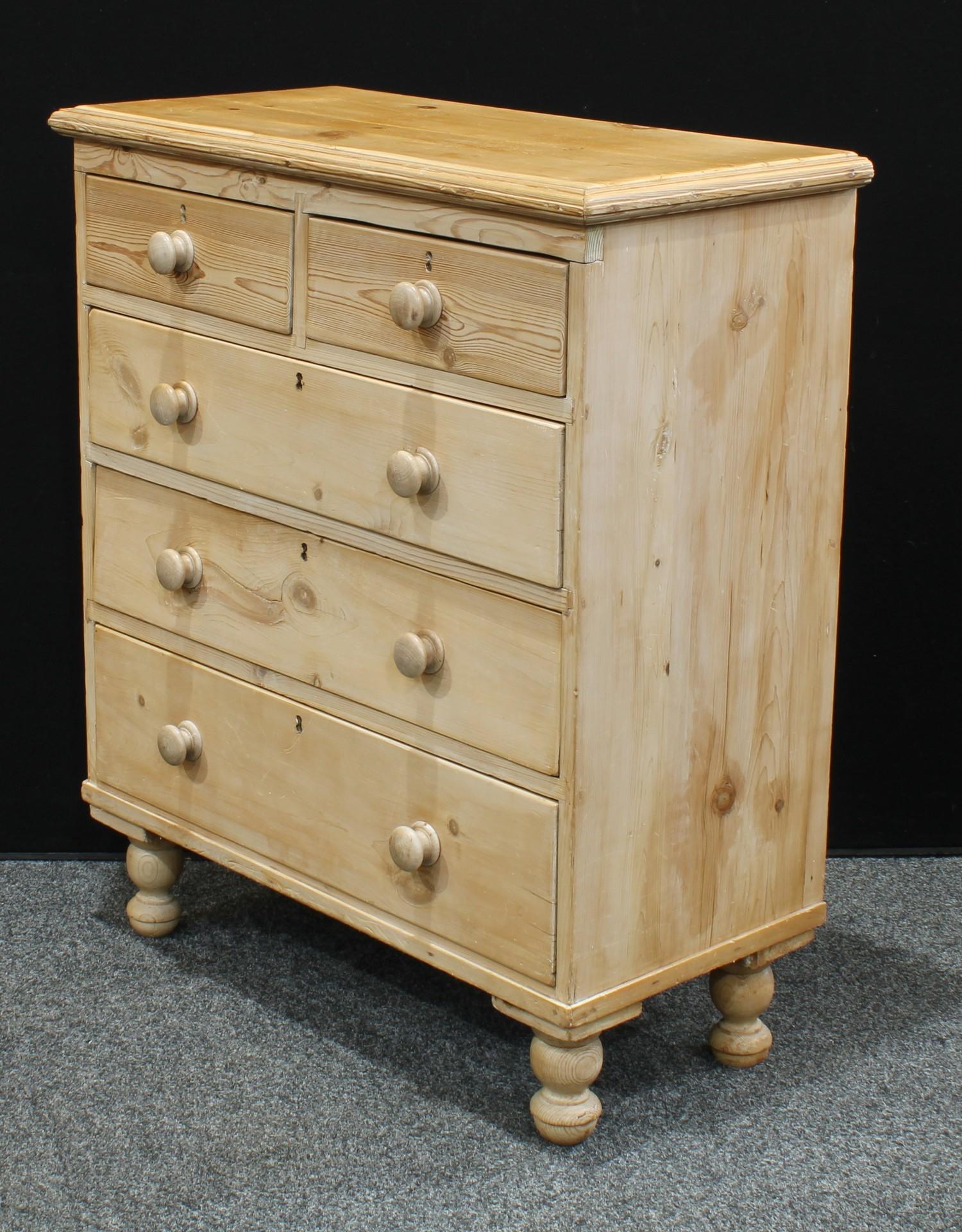 A farmhouse pine chest of drawers, oversailing rectangular top above two short and three long - Image 2 of 3