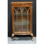 A Hunters of Derby mahogany bow front display cabinet, glazed door enclosing glass shelves, cabriole