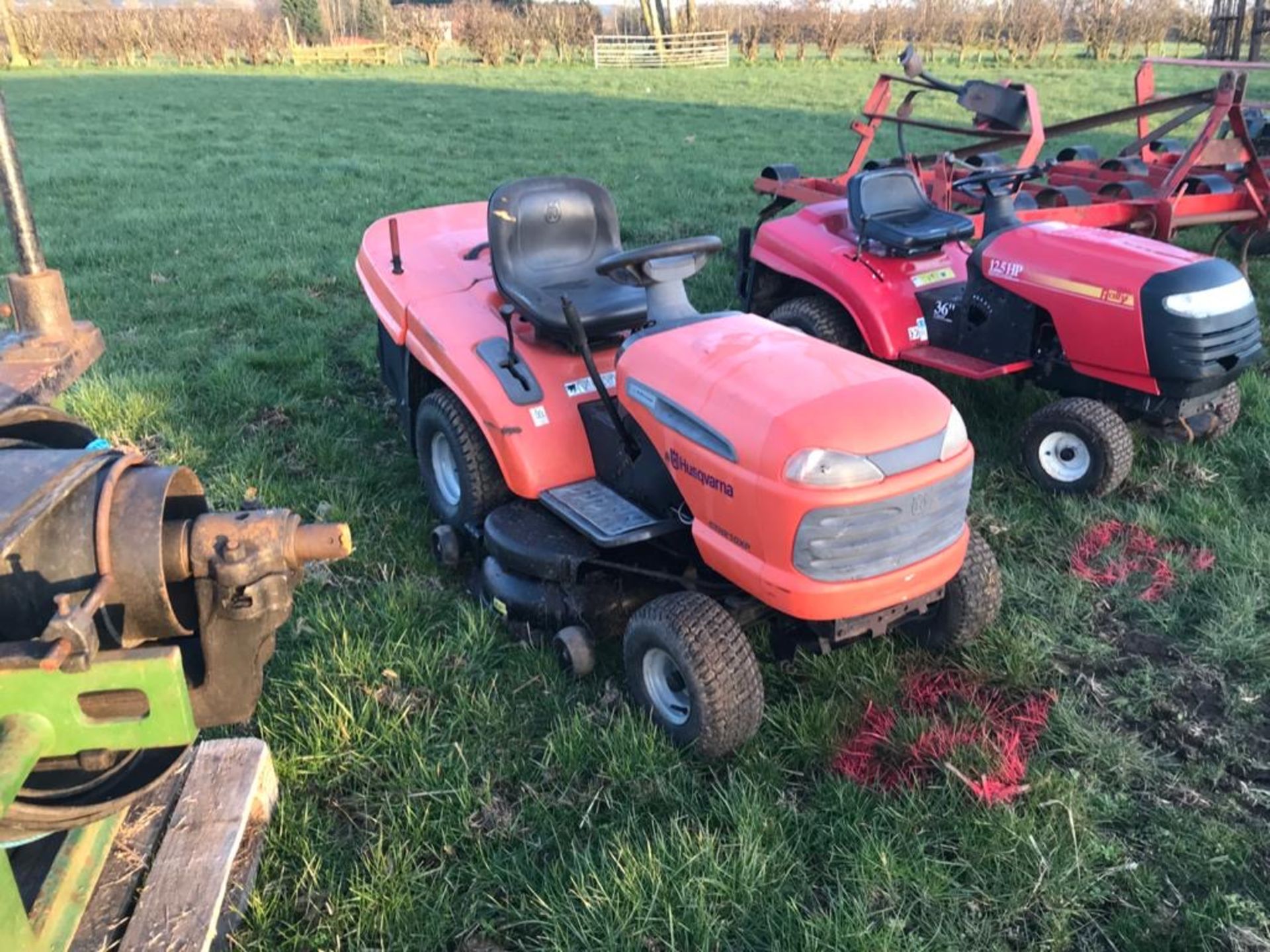 Husvana ride on lawn mower complete with deck and carrier full working order