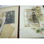 A musical vintage photo album containing a number of black and white family photos