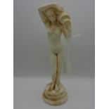 Marbled figure of nude water carrier, 23cm tall