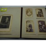 Vintage photo album containing a number of black and white family photos