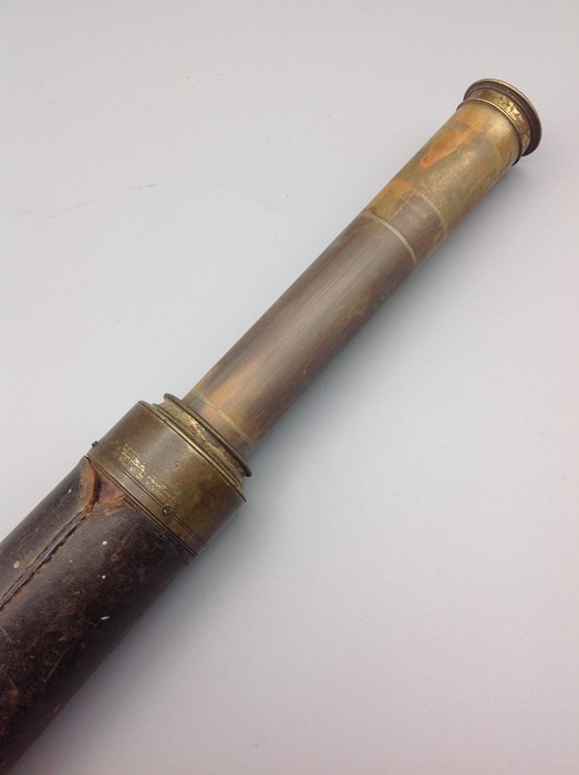 Dolland of London brass telescope in with leather cover