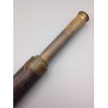 Dolland of London brass telescope in with leather cover