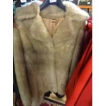 2 ladies 'Fur' coats, size 14 and 12