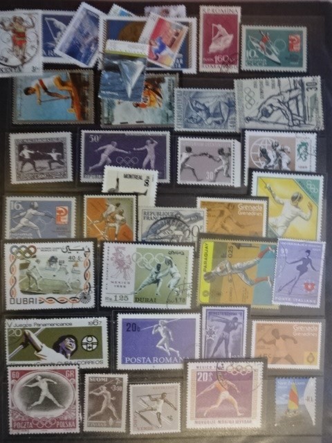 5 sport related stamp albums