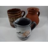 6 pieces of pottery / stoneware including wedgwood jug, R & H Boughton, Camelot pottery etc