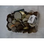 Tub of mixed foreign coins
