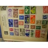 5 folders of mixed stamps