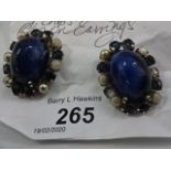 Pair of 1960's Christian Dior clip on earrings (one stone missing)