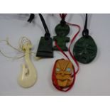 3 South African Verdite pendants, plus wooden New Zealand pendant and bone 'fish hook' pendant