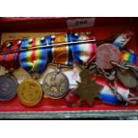 3 x WW1 medals and 1911 Met police medal. S MAJ, W.J Saw ASC with fuel book and other paperwork.
