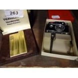 Ronson Varatronic boxed lighter plus novelty camera lighter