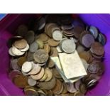Tub of mixed loose coins from all around the world