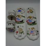 Childs ceramic door handle and plate set depicting nursery rhymes