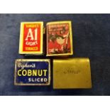 3 enamel and one brass matchbox covers