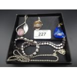 2 silver pendants plus 2 white metal and white stone necklaces and blue stone pendant