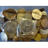 Tub of mixed loose coins from around the world