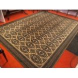Large patterned rug from a country estate 275 x 370 cm