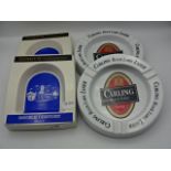 2 Wade ceramic Domecq sherry ashtrays and 2 melamine Carling ashtrays