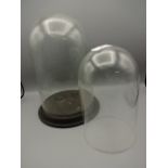 2 glass clock domes, 30 and 20cm tall