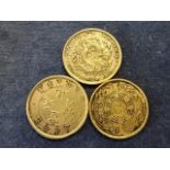 3 oriental coins