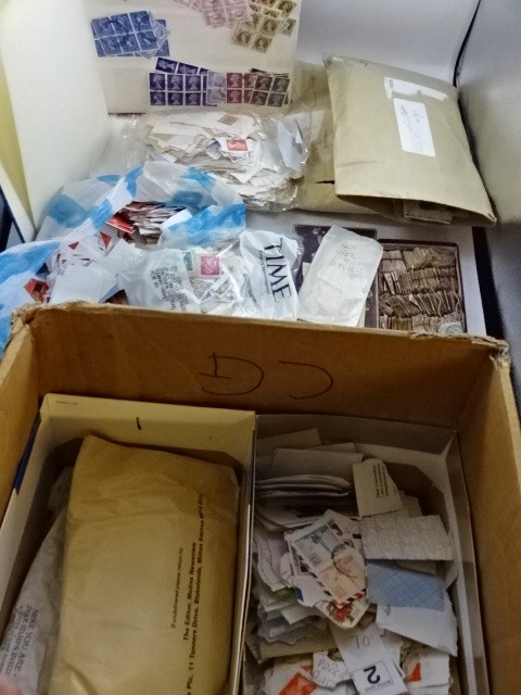 Box of mixed loose stamps from all over the world