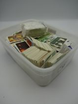 Box of assorted loose tea / cigarette cards