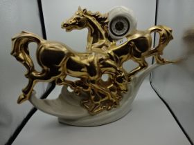 Italian ceramic horse figure with inbuilt mechanical clock, (50 x 40)cm