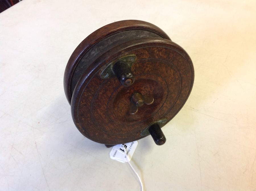 Vintage 5.5' wood and brass Starback fishing reel