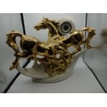 Italian ceramic horse figure with inbuilt mechanical clock, (50 x 40)cm