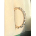 2 Yellow Metal ETERNITY rings ( one has odd stone missing ) total weight 5.7 grams