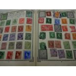 Victory stamp album containing stamps from around the world