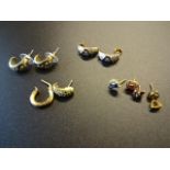 2 pairs of yellow metal stud earrings with white stones plus other yellow metal sundry earrings,