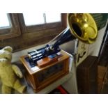 Modern radio and CD player in the form of a vintage gramophone, with remote and instructions