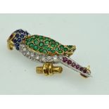 A fine 18ct (.750) designer broach of mixed stones in the form of a parrot