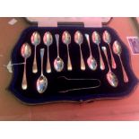 Cased silver teaspoon set of 12 spoons with matching tongs in case. John Sanderson 1913.