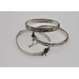 Three sterling silver bracelets