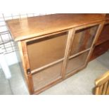Hardwood bookcase with 2 adjustable shelves and sliding glass doors 46 inches wide 39 tall