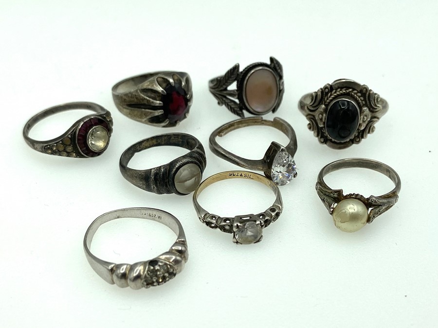 Nine Silver rings of various styles