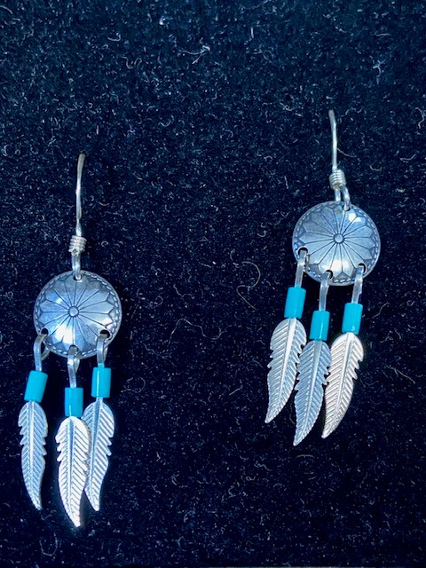 A pair of Boho .925 USA leaf earings in box